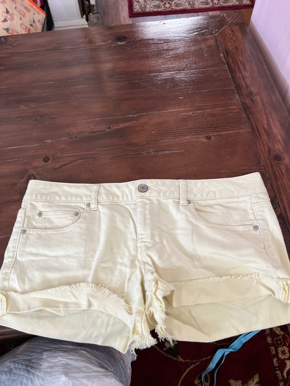 American Eagle Outfitters Pale Yellow Frayed Hem Denim Shorts